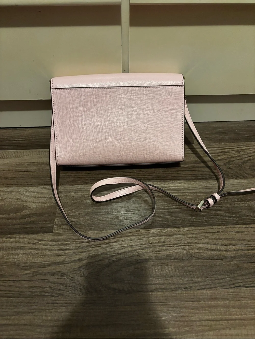 kate spade blush pink leather crossbody bag with gold logo